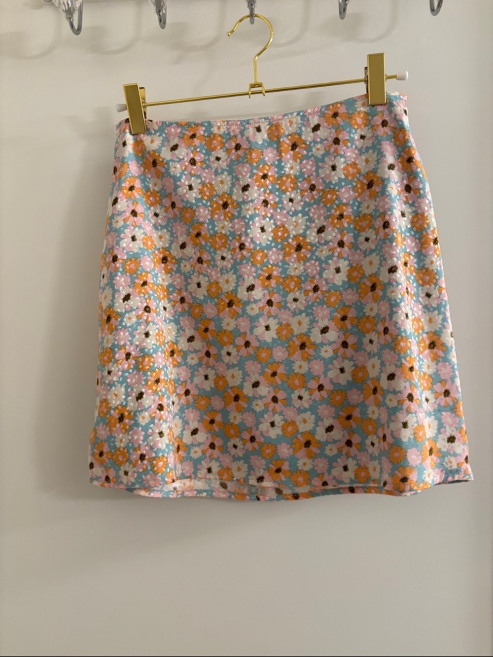 Altar'd State Pastel Blue Floral Mini Skirt with Orange Accents